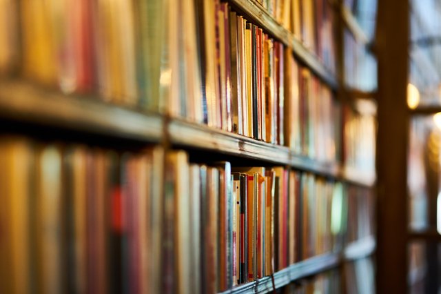 selective-focus-photography-of-brown-wooden-book-shelf-2952871.jpg